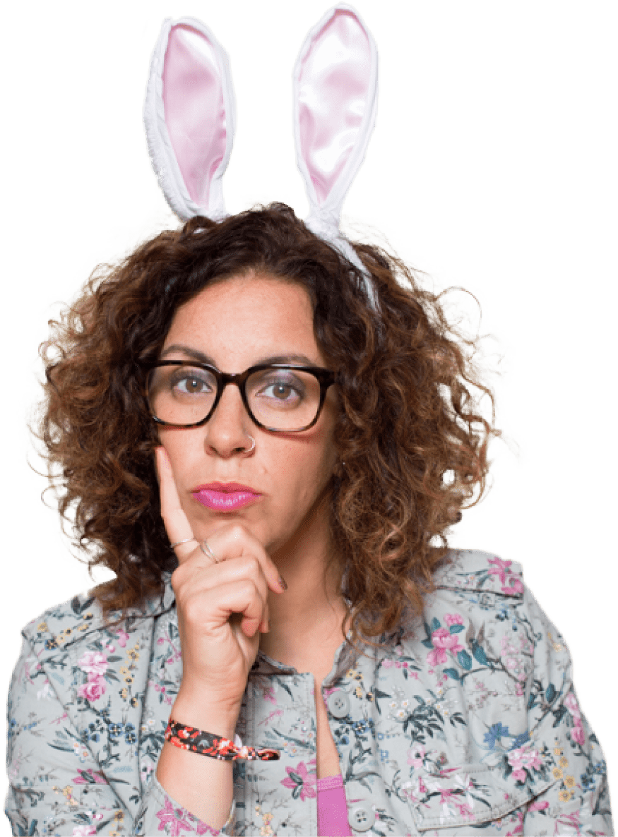 Image of Jill Salzman giving a pensive look while wearing a pair of bunny ears.